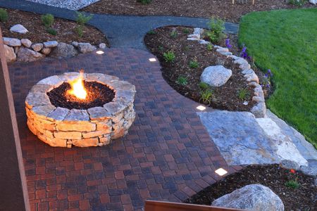 Fire pit and hardscape design at a client's residential property.